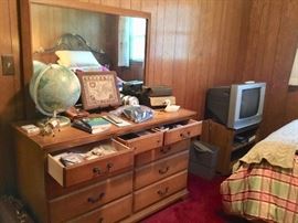 Dresser, globe, tv, guy stuff
