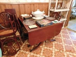 Mahogany dining table and six chairs.