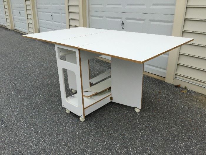 Sewing Table on Wheels       http://www.ctonlineauctions.com/detail.asp?id=747664