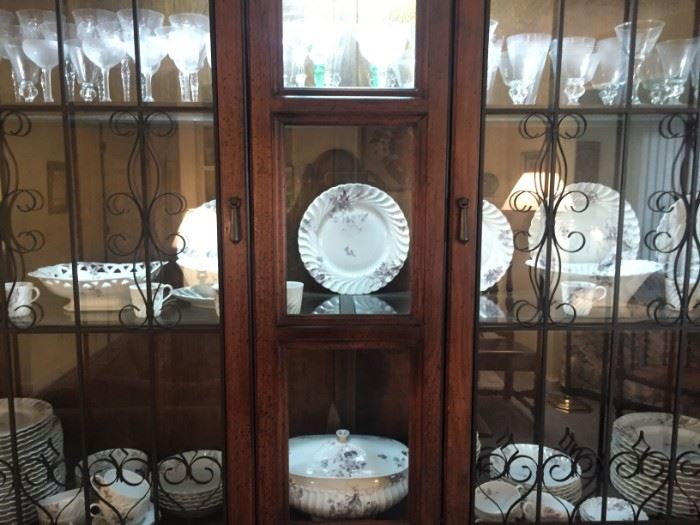 Large lighted China cabinet.