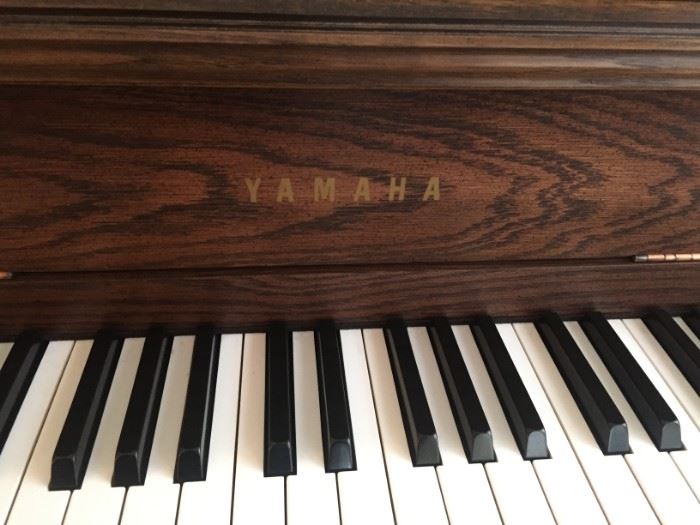 Yamaha Mediterranean upright piano.