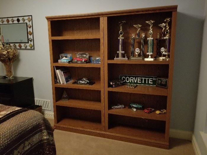 Corvette die cast cars, trophies and book shelves