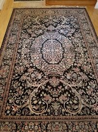 This is a large 100% wood Persian Carpet with it's authentication. 