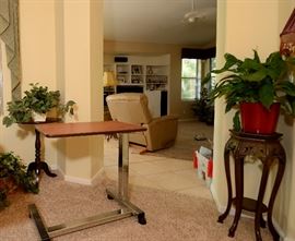 Bedside table used in hospitals. Great for reading, eating, playing games. Rolls easily from room to room.