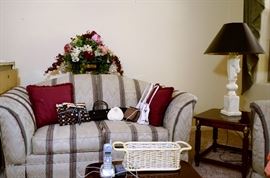 Horse sculpture lamp for sale. Loveseat for sale too. Pillows, purses. more florals, side table, baskets.