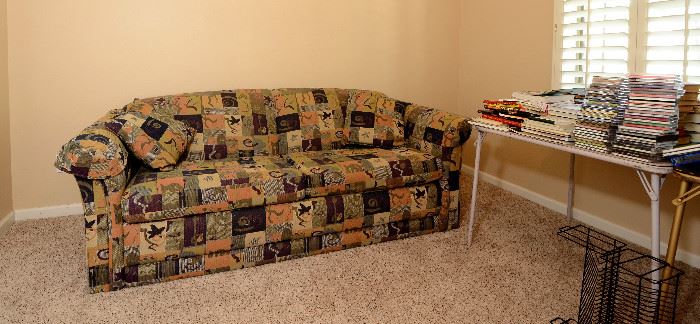 Sleeper sofa in a nice pattern of browns.