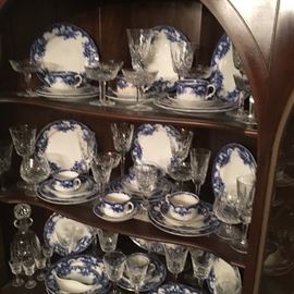 Large set of “Versailles” pattern flow blue by Furnival. Includes place setting for 10, (dinner and cake plates, tea cups and saucers, bowls, salt dishes, bone dish), covered and uncovered vegetable bowls, platters, covered butter dish, gravy boat, sugar/creamer. 
  Beautiful set! 