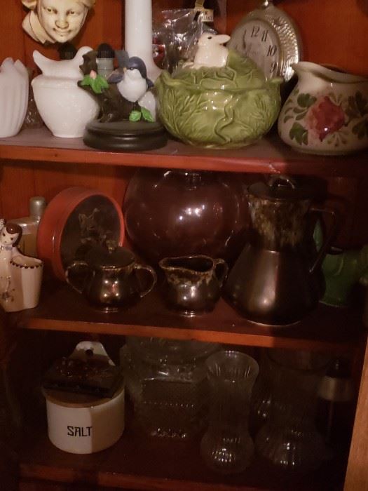 Glassware; pottery; clock and other collectibles inside nice corner cabinet.