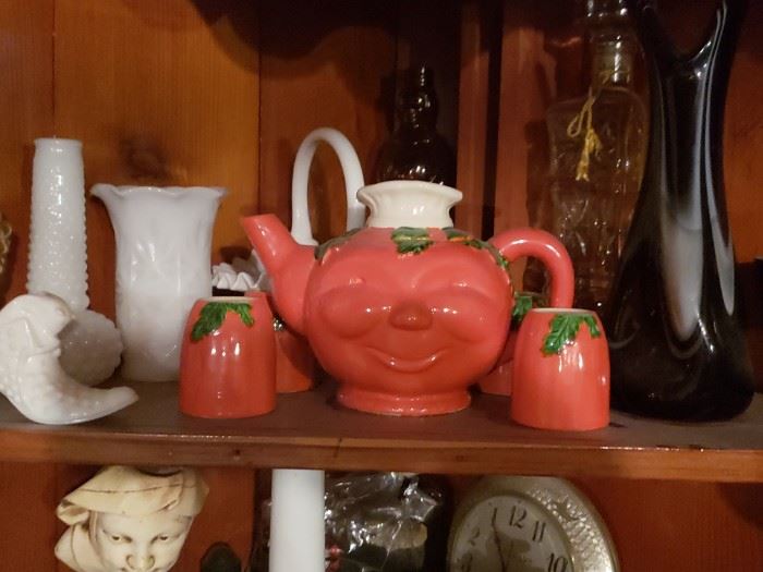 Same corner cabinet, teapot set, vases, hobnail.