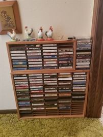 Cassette tapes in wood cases; more figurines and wall art.