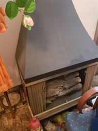 Movable electric fireplace.