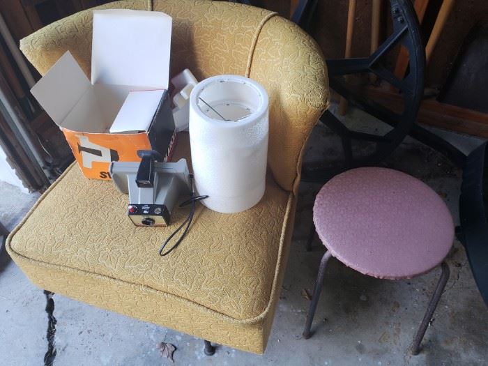 Vintage chair and stool; MCM lamp shade; Polaroid.
