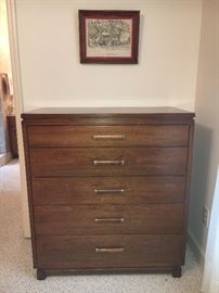 Mid-century modern bedroom group by Ramseur (Ramseur, NC) includes dresser with plate glass mirror, chest, queen bed with bookcase headboard and 2 nightstands. Each piece priced separately, or buy it all at a special price.