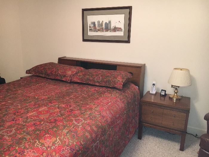 Mid-century modern bedroom group by Ramseur (Ramseur, NC) includes dresser with plate glass mirror, chest, queen bed with bookcase headboard and 2 nightstands. Each piece priced separately, or buy it all at a special price. 