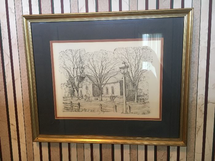 Framed Williamsburg prints.