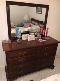 Vintage Young Hinkle mahogany bedroom group—full bed, dresser with mirror and one nightstand.