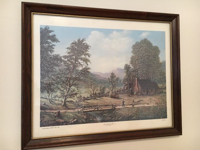 Assorted wall decor, including original paintings and framed prints.