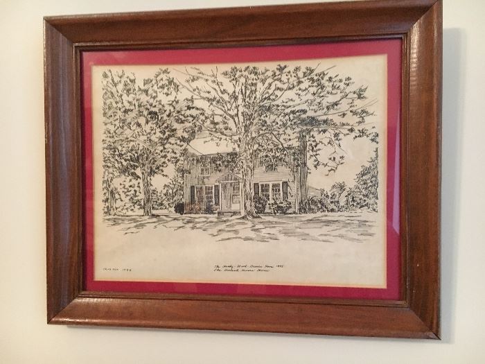 Framed Williamsburg prints.