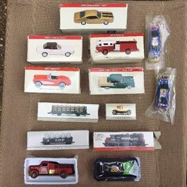 Assorted toy vehicles new in boxes.