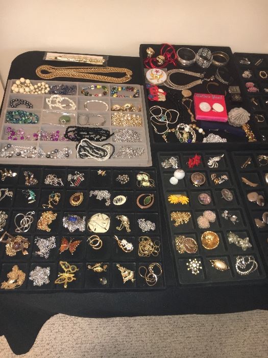 Lots of vintage costume jewelry, Sarah Coventry and more—some sterling silver.