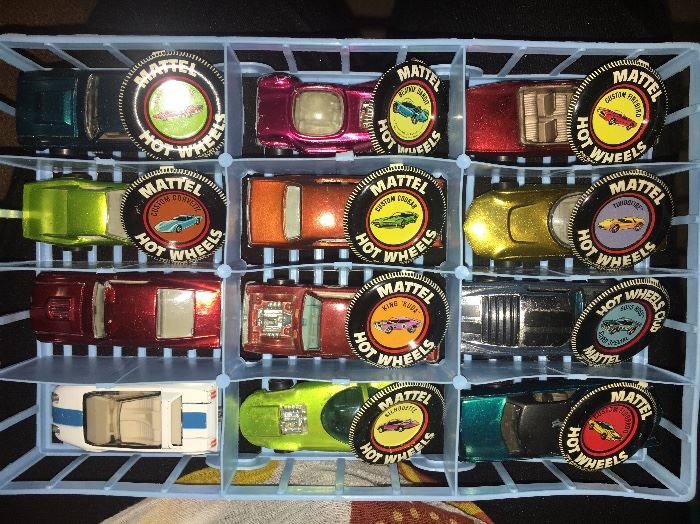 Over 40 1960s redline Hot Wheels cars, in played-with condition but not abused. Most have the coordinating metal badge.
