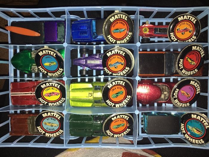 Over 40 1960s redline Hot Wheels cars, in played-with condition but not abused. Most have the coordinating metal badge.