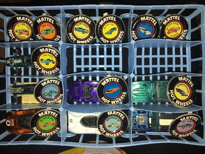 Over 40 1960s redline Hot Wheels cars, in played-with condition but not abused. Most have the coordinating metal badge.