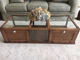 Antique oak counter top display cabinet, shown here as a coffee table.