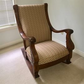 One of three antique rocking chairs.