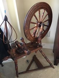 Antique spinning wheel.