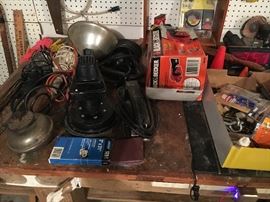Workbench filled with tools, power and hand tools.