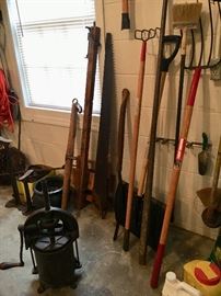 Antique items and yard tools.