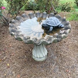 Concrete bird bath.