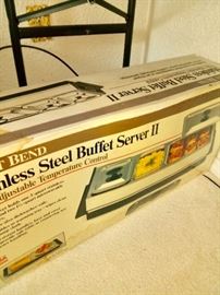 Several brand new stainless buffet servers 