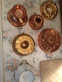 Copper molds and vintage colander 