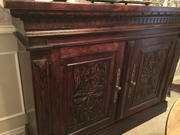 Custom hand carved and stained buffet. 