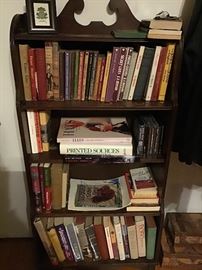 Books and antique bookcase