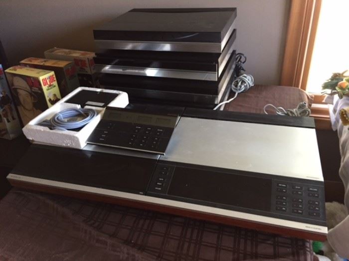 Bang Olufsen Stereo System and Control Deck.  Includes 4 Speakers.