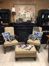 Portable fire place. Decorator prints, accent pieces, and accent pillows.