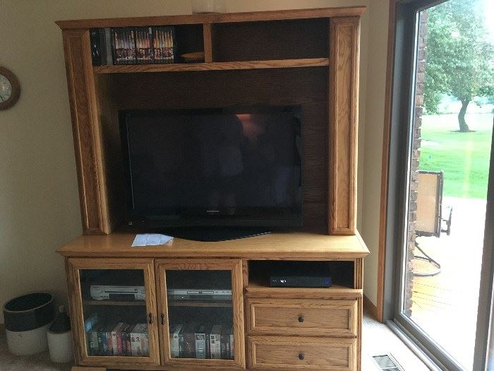 This entertainment center can be used for more than just a TV -- the flat screen is available along with the nice stoneware crocks to the left.