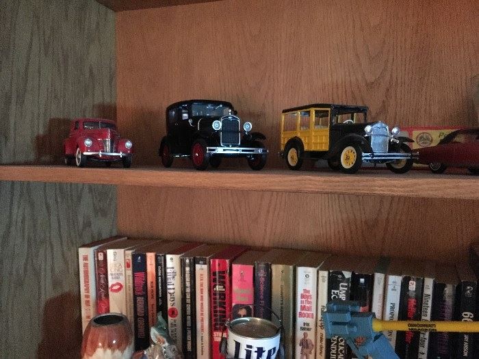 The owner has some interesting books and these neat cars.