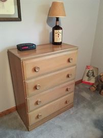 chest of drawers -- notice Seagram's lamp.