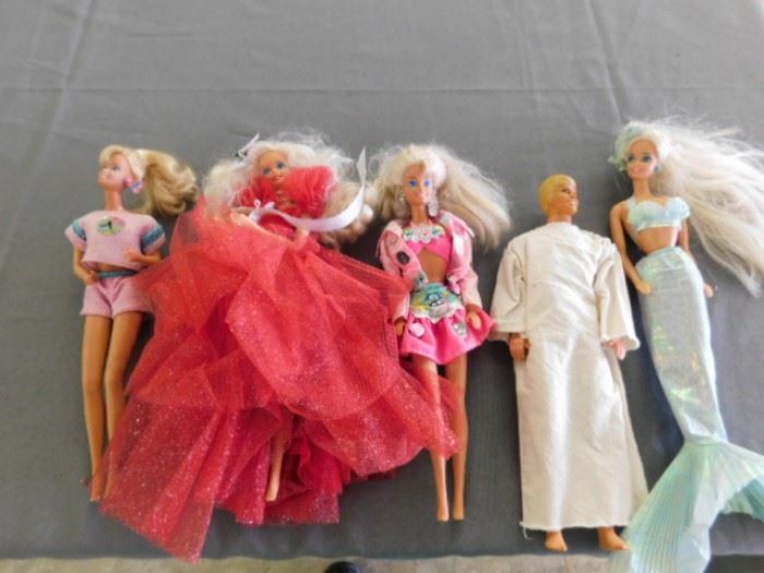 Older Barbies including The very first Holiday Barbie 1988