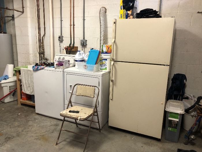 Speed Queen washer, dryer, GE refrigerator, cleaning supplies and chemicals