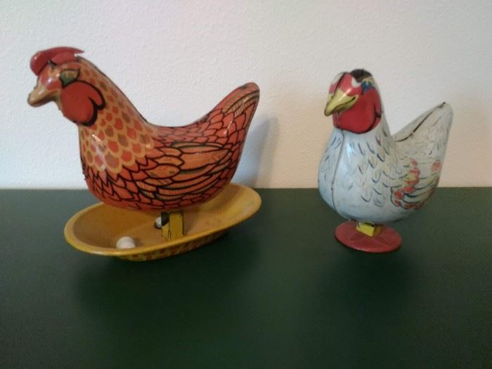 VINTAGE MECHANICAL CHICKENS INSERT MARBLE AND PUSH DOWN TO LAY EGG.  WAYANDOTTE AS SEEN ONE IS MISSING COMB