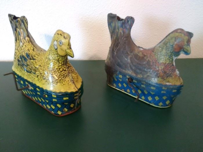TWO ANTIQUE TIN WIND UP CHICKENS.  BALDWIN MFG. MARBLE INSERT AND WIND UP TO LAY EGGS AND COCK-A-DOODLE-DO
