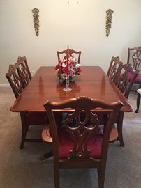 This dining room table and chairs are nearly flawless. 