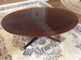 oval Mahogany Coffee table with Brass Clawfeet