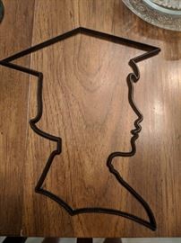graduation stencil and two wine glasses