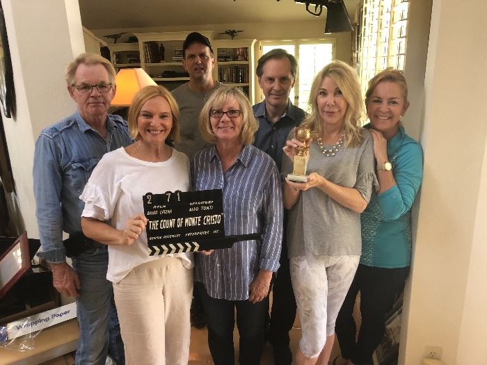 And the winner is... for best Esatate sale co. Griffin &  Team, holding a real clapper & real Golden Globe. Sorry Golden Globe is not for sale!